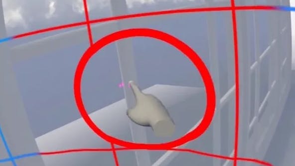 AR view of a hand with the pointer finger touching a window.