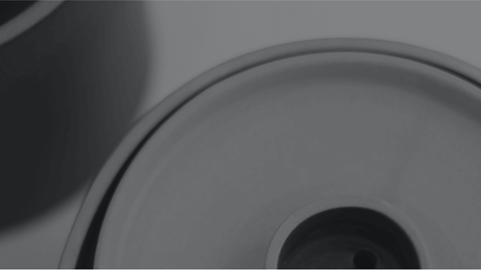 A minimal black and white detail image of the a Stäk coffee maker